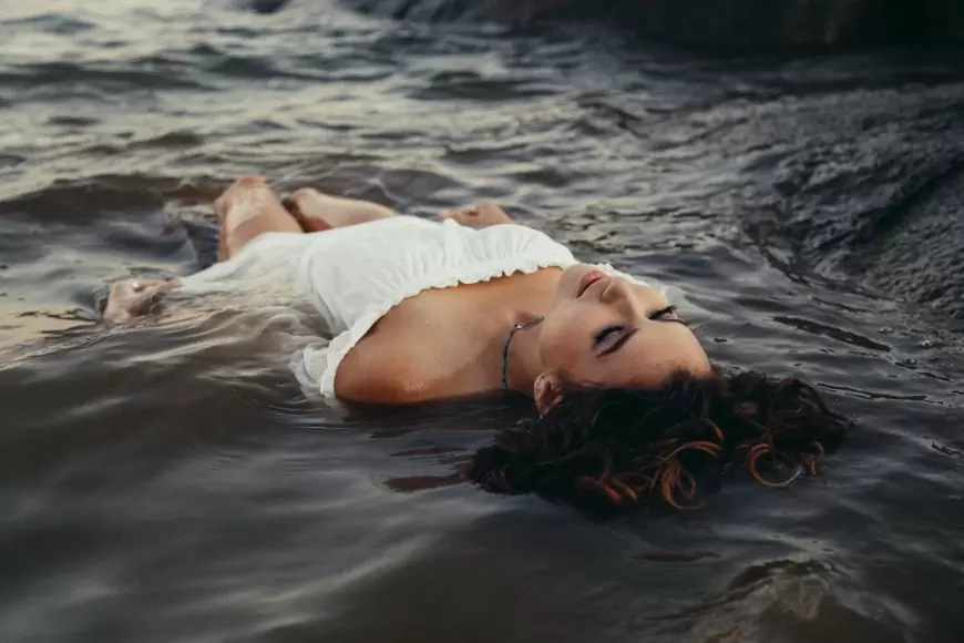 There is a unique and captivating beauty when a woman enters the water